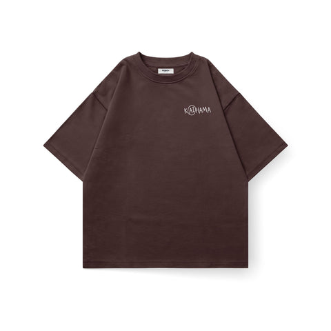 Kaihama oversized T-shirt with "I Told ChatGPT About U" printed in bold black text on a white casual shirt.