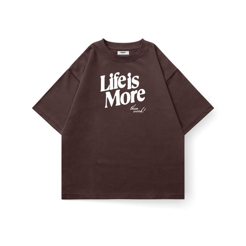 Kaihama Life Is More oversized T-shirt in soft fabric, featuring bold graphic text on front, casual fit, and relaxed style.