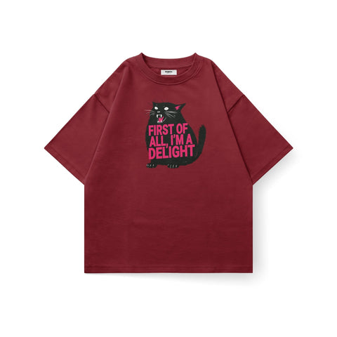 Kaihama oversized T-shirt with "First of All, I'm a Delight" printed slogan, casual fit, soft fabric, in neutral color.