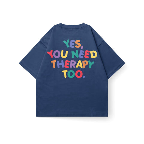 Kaihama You Need Therapy Too oversized T-shirt with bold black text on white fabric, relaxed fit, casual streetwear style