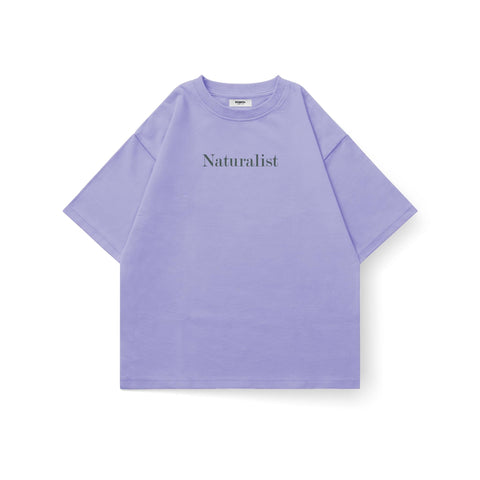 Kaihama Naturalist oversized T-shirt in neutral fabric, featuring a relaxed fit and minimalist design, displayed on a mannequin.