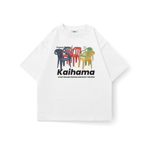 Kaihama We Sit, We Heal oversized T-shirt featuring bold text design in soft cotton fabric, casual and comfortable for everyday wear.