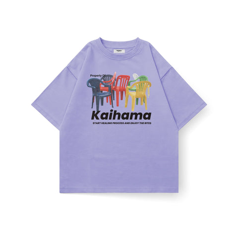 Kaihama We Sit, We Heal oversized T-shirt featuring bold text design in soft fabric, casual fit, and relaxed style.
